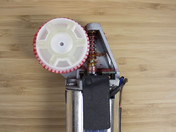 Close up of lubricant on worm drive for Uplift Desk motor
