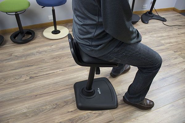 Sitting in VARIchair to show seat size