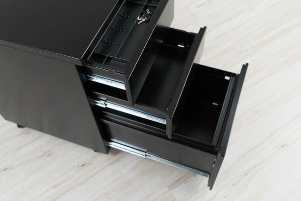 Drawers open on full size pedestal