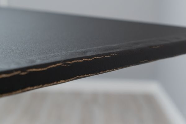 Long term water damage side of powder coated surface