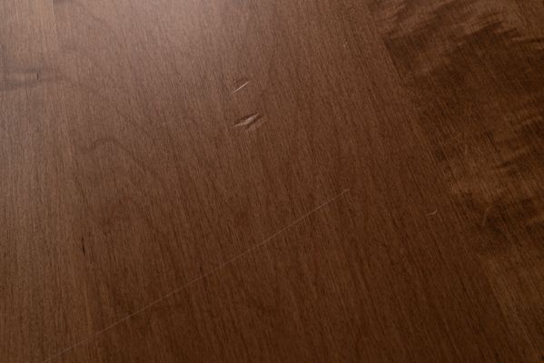 Scratch and drop test on maple hardwood