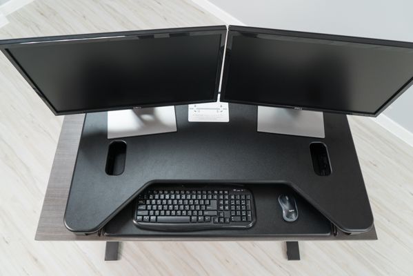 Keyboard tray stowed away