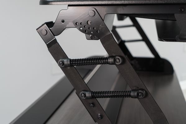 Pin and spring locking system