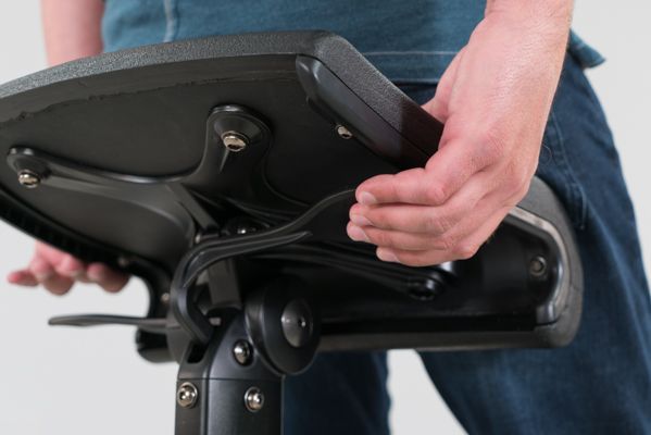 Under seat height adjustment paddle