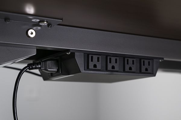 Four grounded plugs integrated into control box