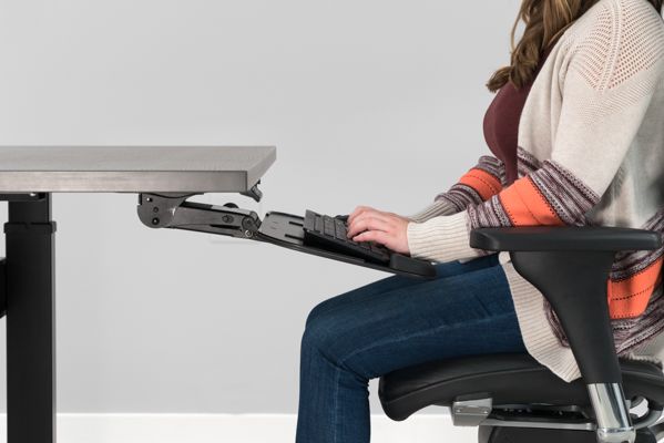 Positive tilt on keyboard tray
