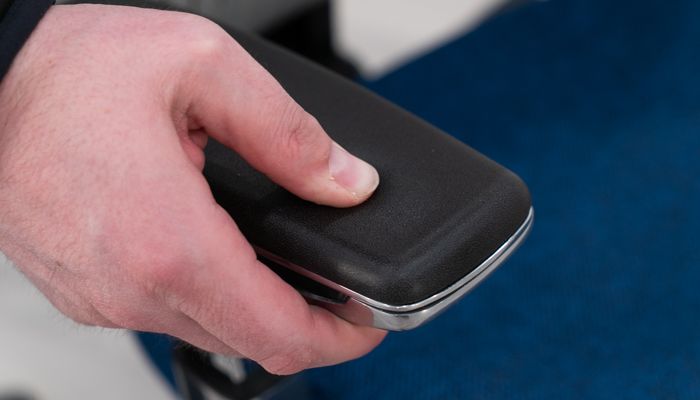 Pushing down on arm pad