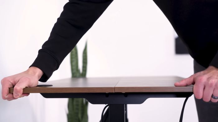 Thin two-piece top on cheaper standing desks