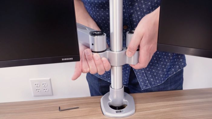 Monitor arms may be hard to adjust