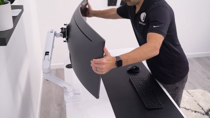 Can hold TVs that are used as monitors